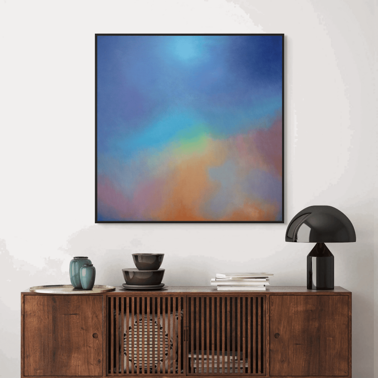 Abstract oil painting titled Aura Aurora by Marcus Callum featuring blended blues purples yellows and reds to evoke energy and uplift in room setting.Original Painting: "Aura Aurora" (Available)